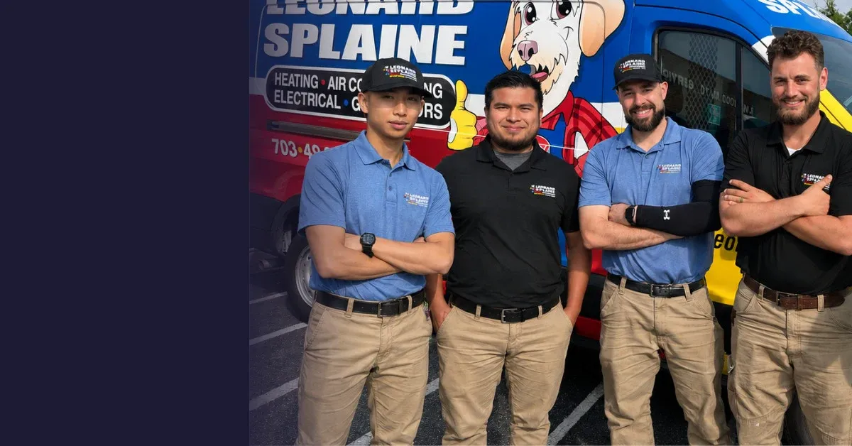 Four Leonard Splaine technicians standing in front of a branded service van