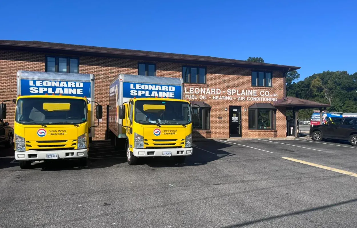 Leonard Splaine box trucks parked outside the Woodbridge office