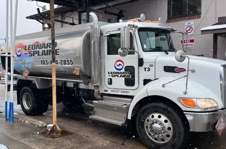 A Leonard Splaine heating oil delivery truck out on a winter route