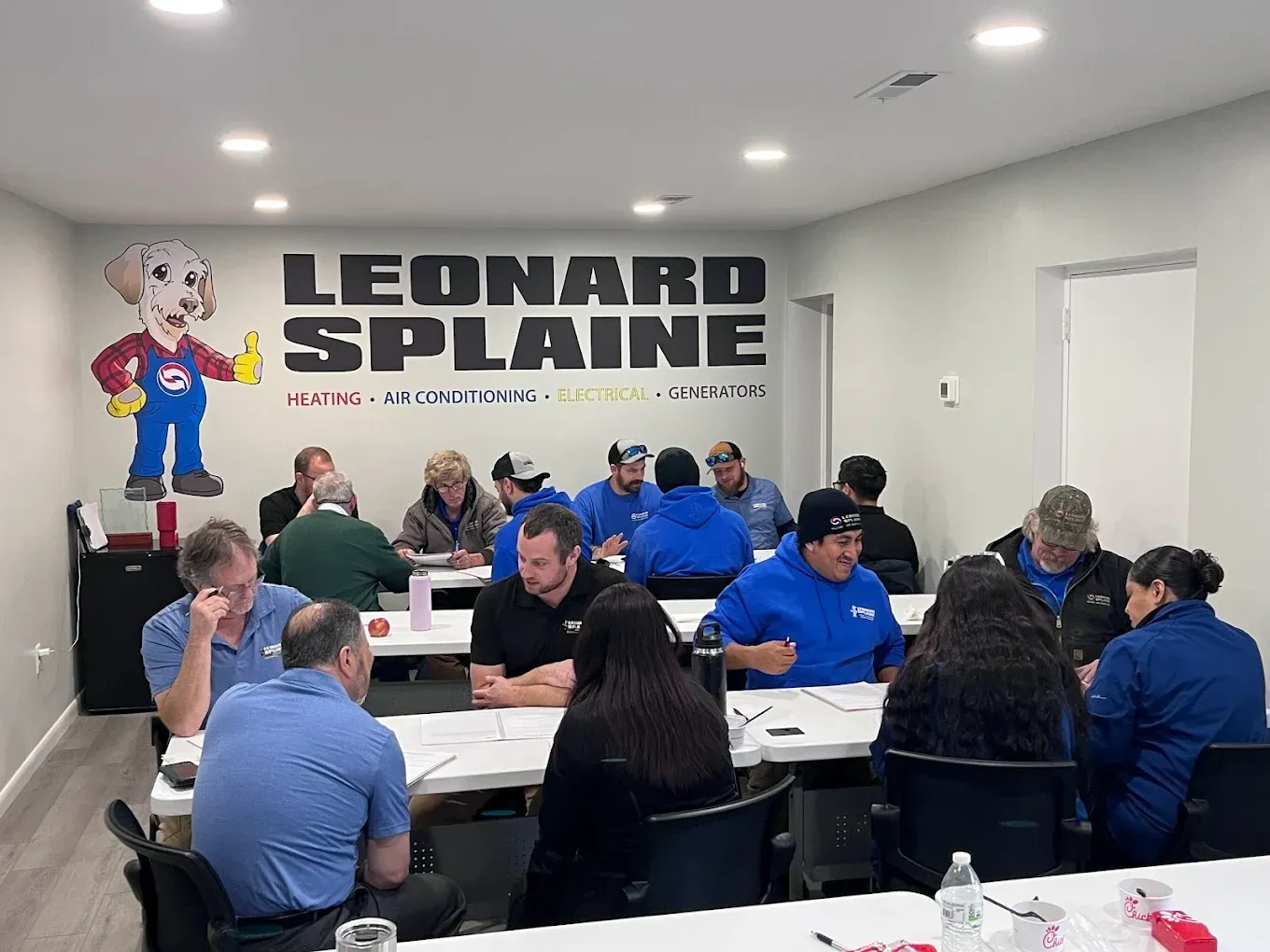 Leonard Splaine technicians in a training session