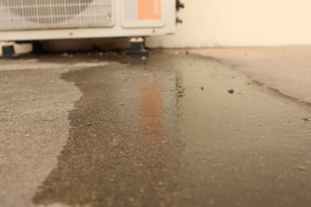 wet floor caused by a water leakage for an AC Unit
